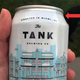 You can see the sleeve’s gap between the label and the lip of the can. (And say hi to my dog in the background.)